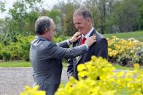 Prof Sean Tierney presents Dr Ronan Boland with the chain of office