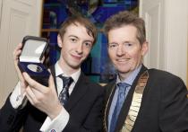 Liam O'Neill (Trinity College) IMO Student Debate Winner and IMO President Dr Paul McKeown