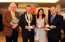 Dr Ken Egan, Dr Ronan Boland, Mrs Lisa Boland and Dr Fenton Howell attend the exhibition at the AGM