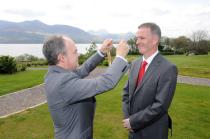 Prof Seán Tierney presents Dr Ronan Boland with the chain of office